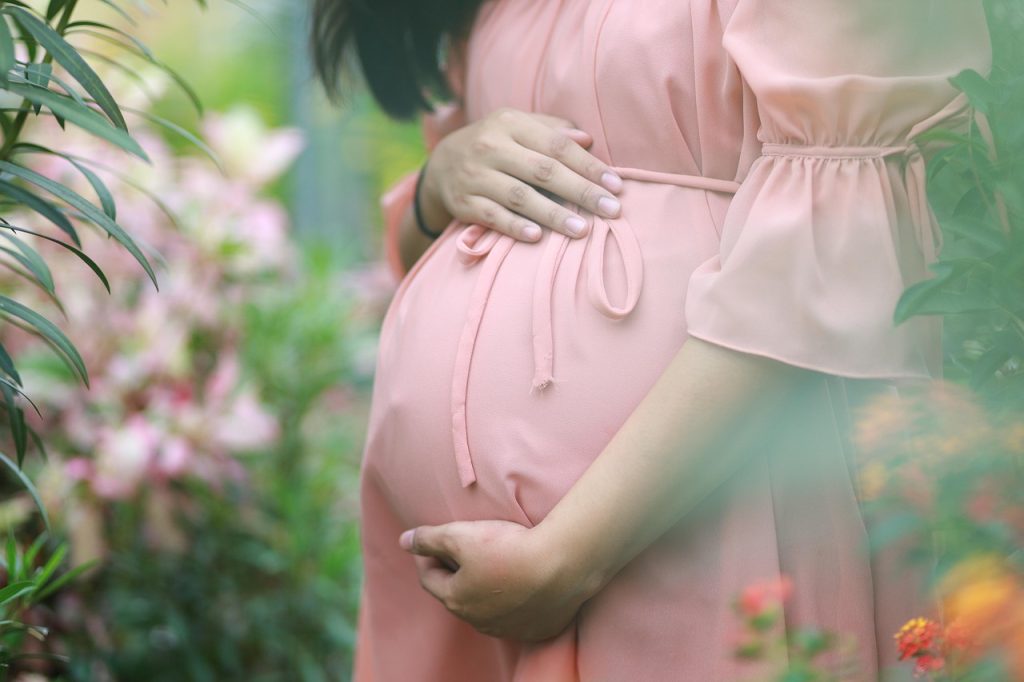 Pregnant, woman, belly — Discover Atomic Wallet: Your Crypto Management Tool