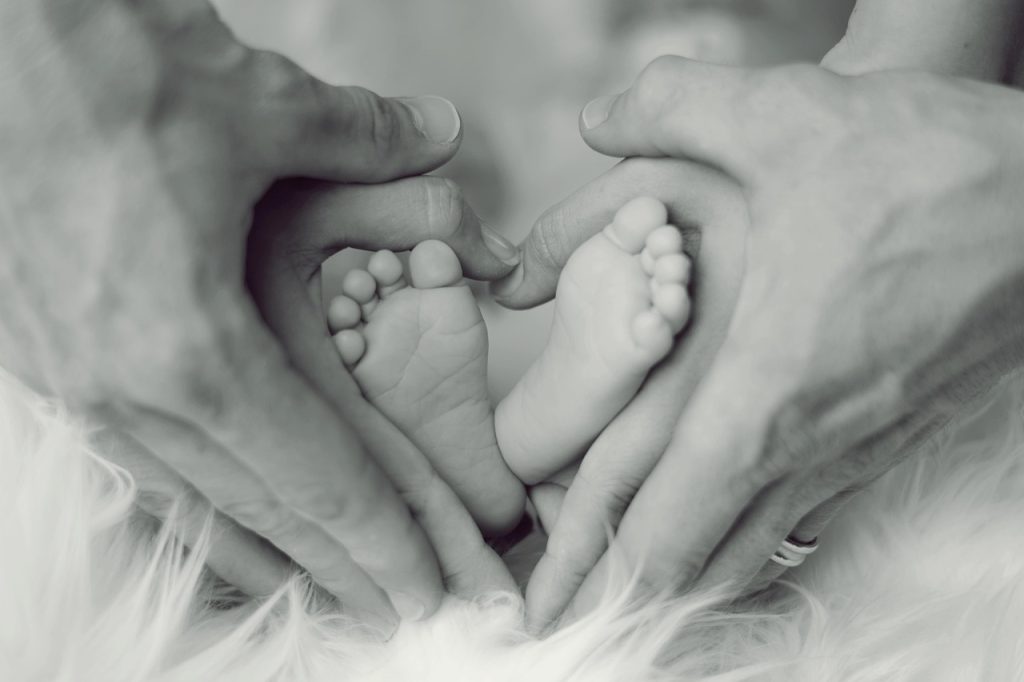 Infant, feet, father — Experience Secure Transactions with the Ledger Live App