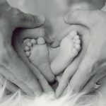 Infant, feet, father — Experience Secure Transactions with the Ledger Live App