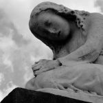 Statue, praying, kneeling — Harnessing the Power of Bscscan for Crypto Enthusiasts