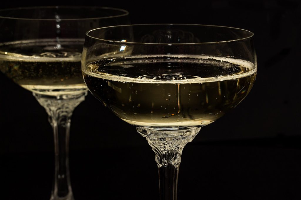 Champagne glasses, sparkling wine, glasses — Master Your Crypto Journey with Atomic Wallet Now